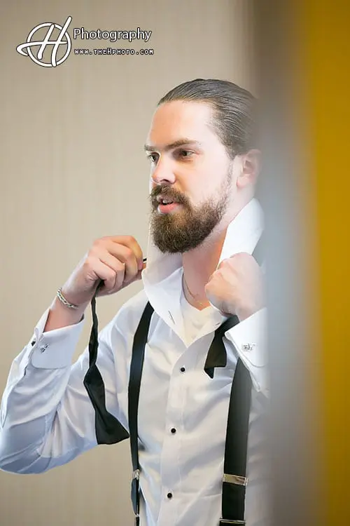 groom in mirror