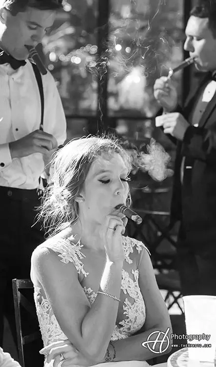 Christina smoking cigar