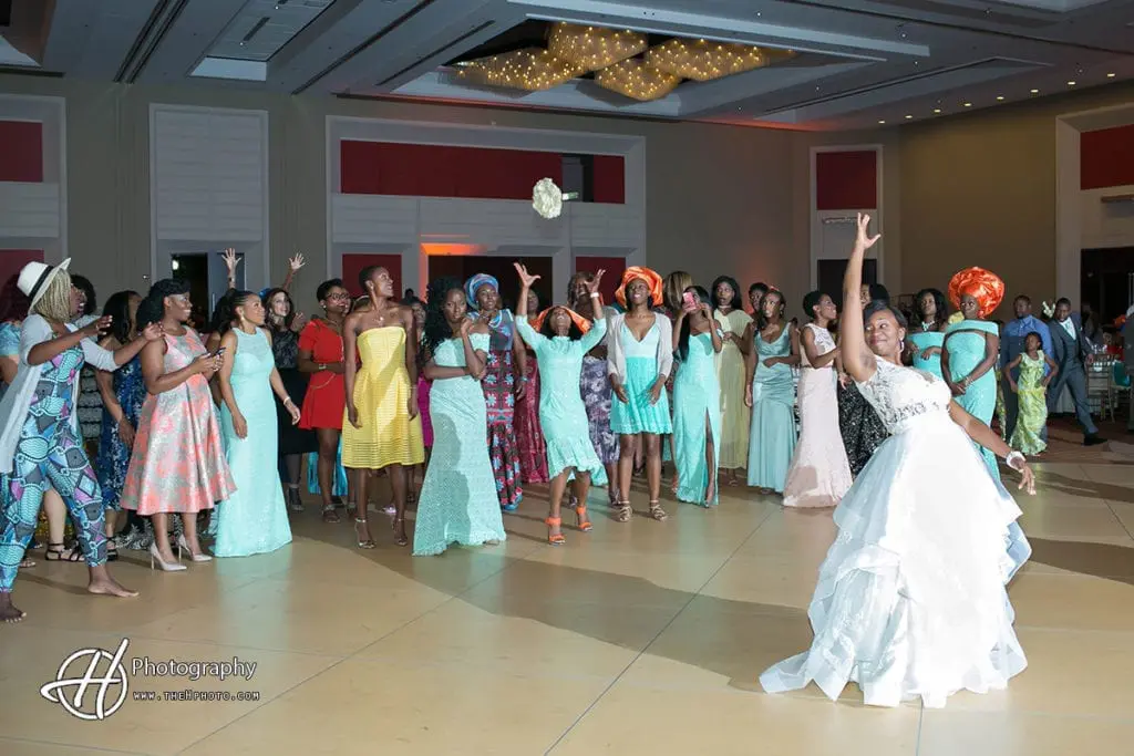 wedding portrait at Hyatt Regency O’Hare in Rosemont Bouquet-toss-nigerian-wedding