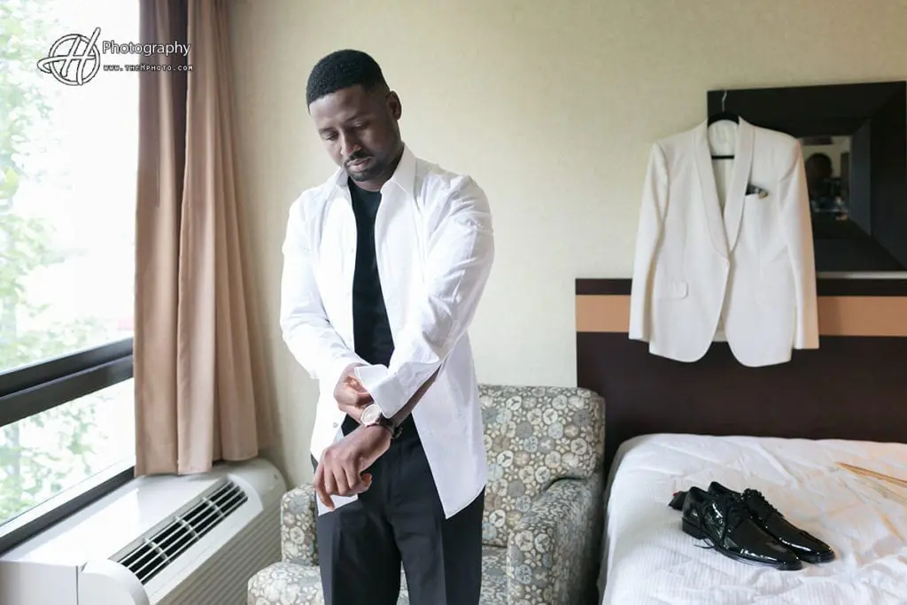 groom getting ready Double Tree Hotel
