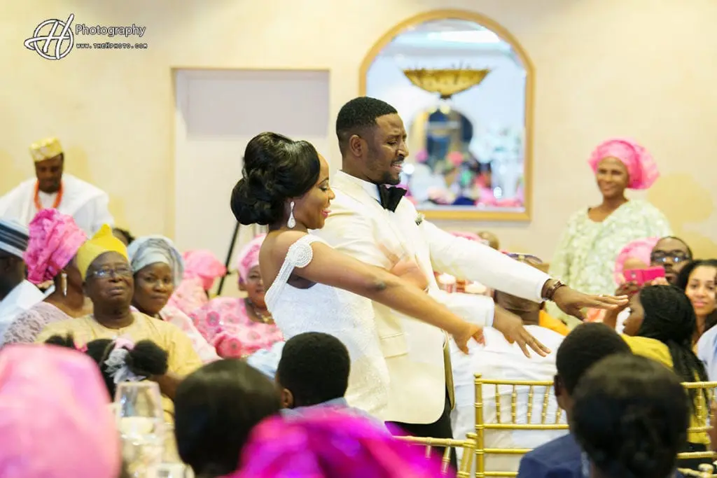 bride and groom entering reception