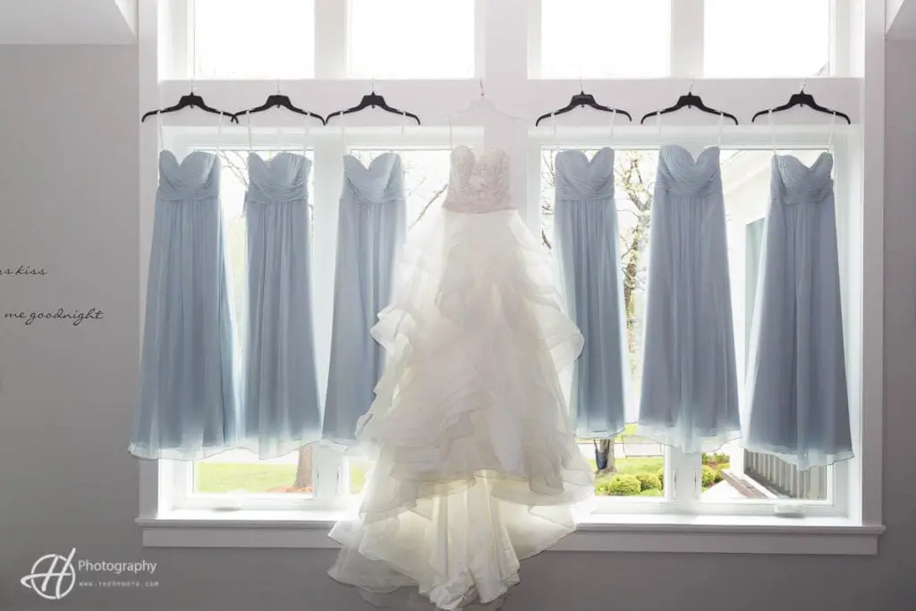 wedding dresses hanged in the window