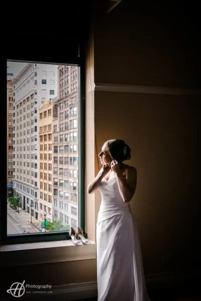 Debbie fixing the ear rings