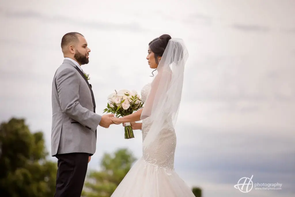 Tanya and Jesus sharing their vows. Jesus+Tanya