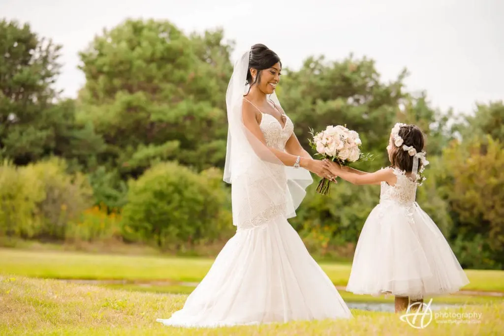 Tanya and Bella the flower girl posing. flower-girl-bride