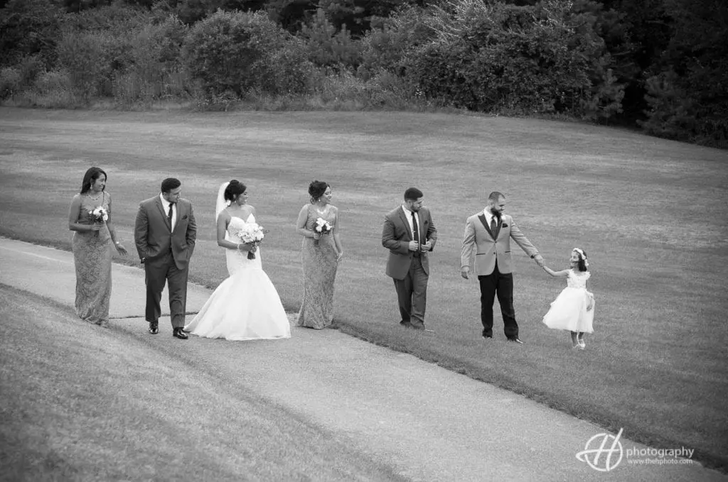 Group photo of bridal party and flower girl. mexican-party