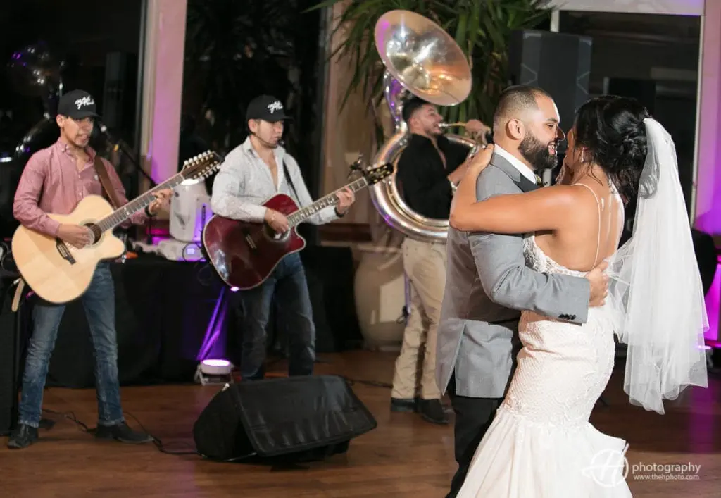 The quitar band rockin the hall. dancing