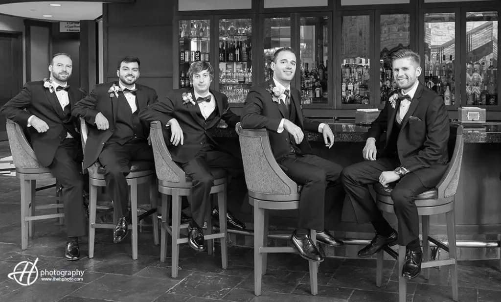 groomsmen by the bar