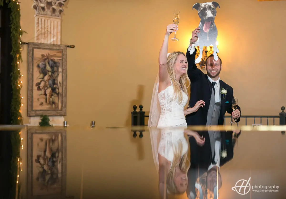 bride and groom entering the wedding venue