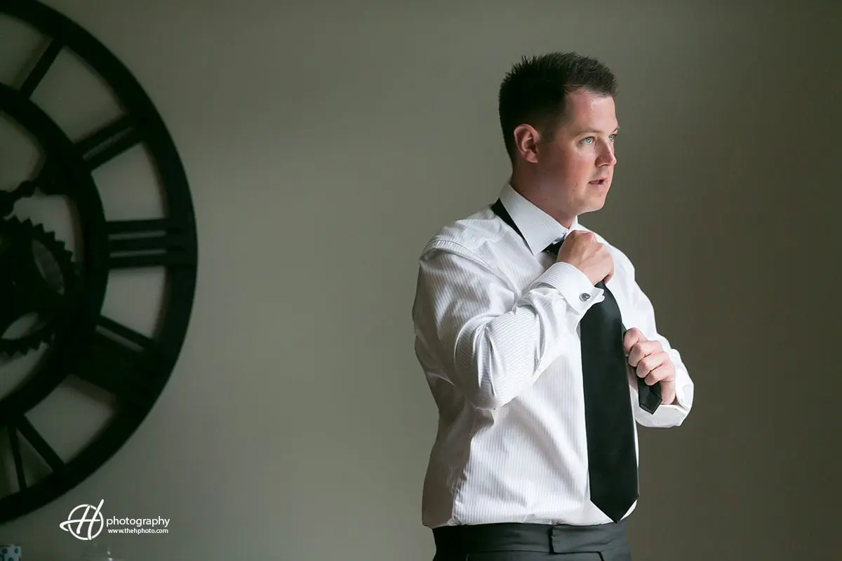 Dan getting ready. groom getting ready in Naperville.