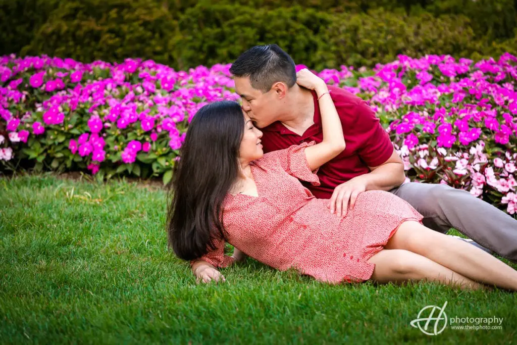 wore a red/floral dress. Bryan wore a red collar shirt + grey jeans. dress for engagement