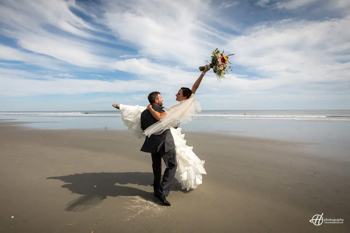 holding the bride and spinning around 