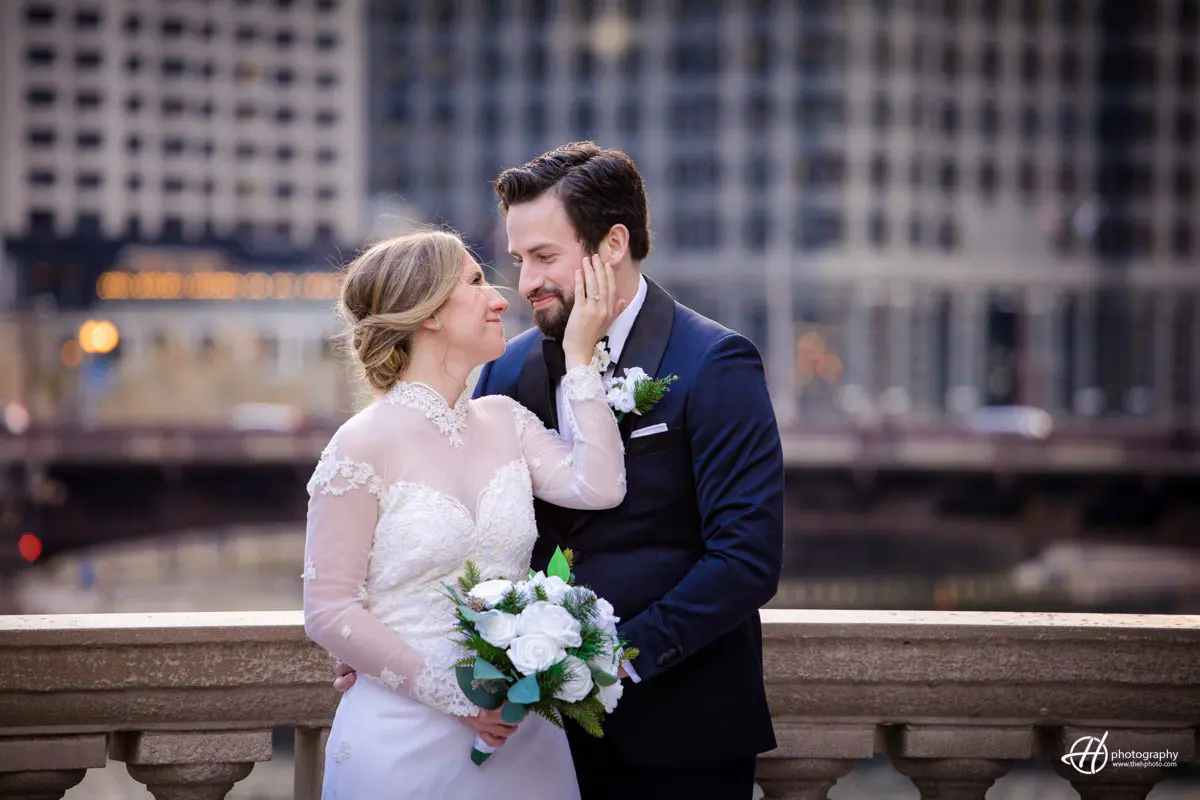 Mary and John at the first photography spot by the Wrigley Building. bride and groom