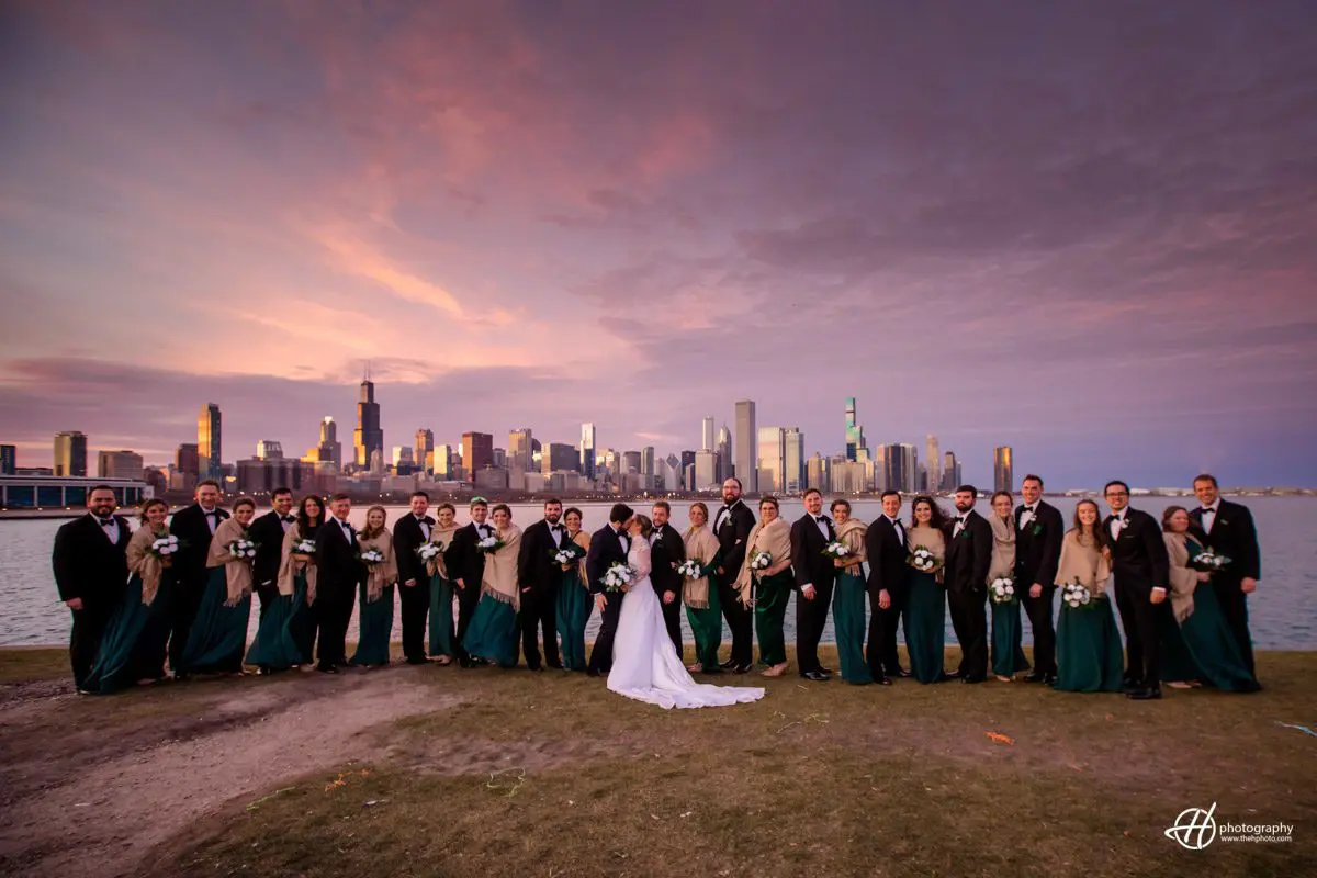 Bridal Party with Chicago skyline in background. dramatic light