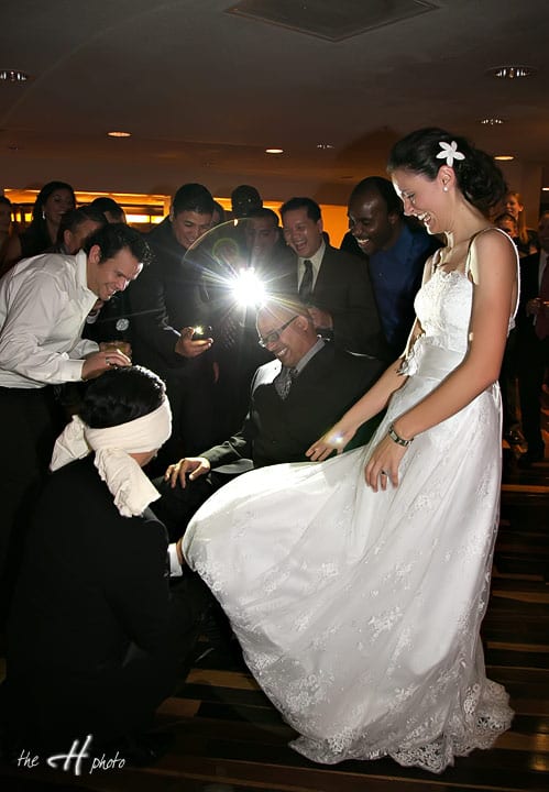 groom getting the garter