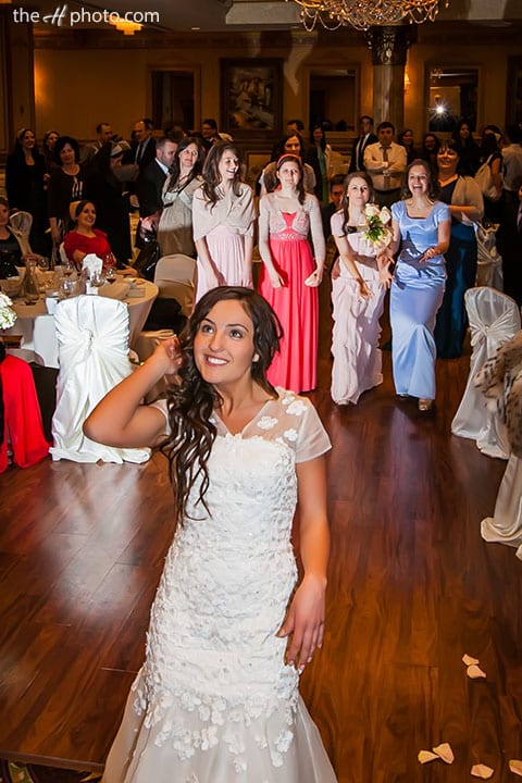 bride tossing the bouquet