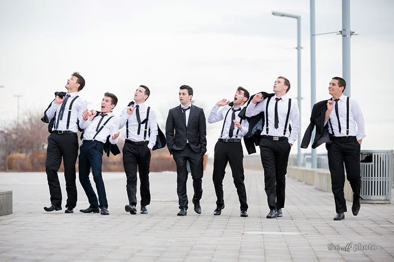 wedding photos with groomsmen on Detroit Riverwalk