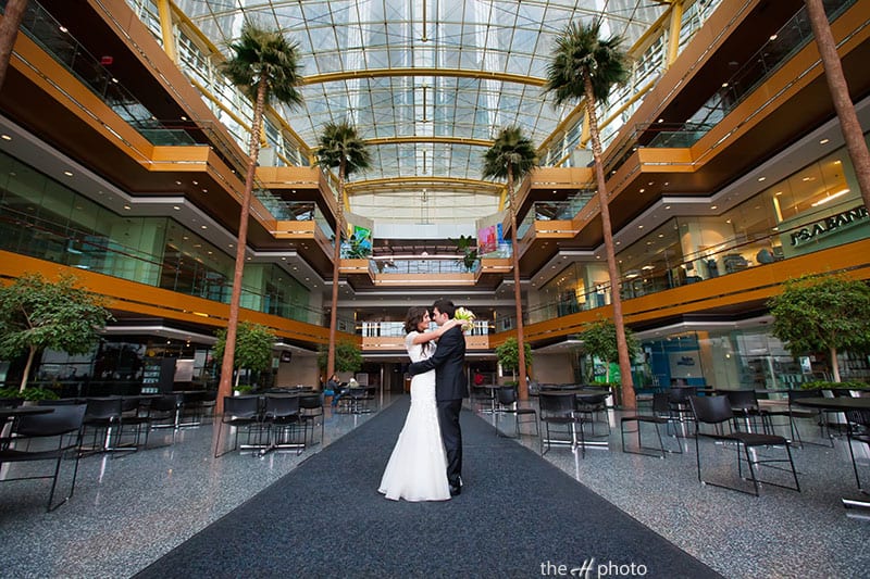 different posing ideas for bride and groom inside the GM building