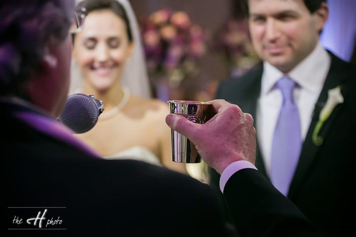 Raby Hart blessing the bride and groom 