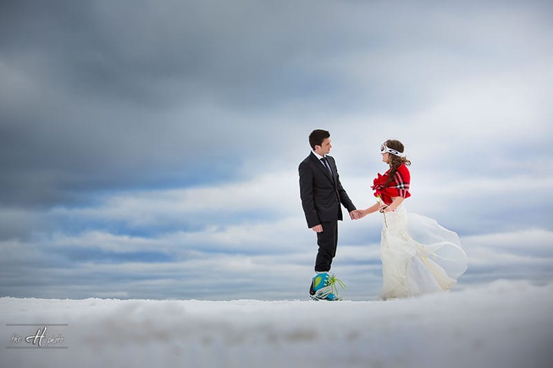 Bride and Groom had the idea of wedding photos in snow