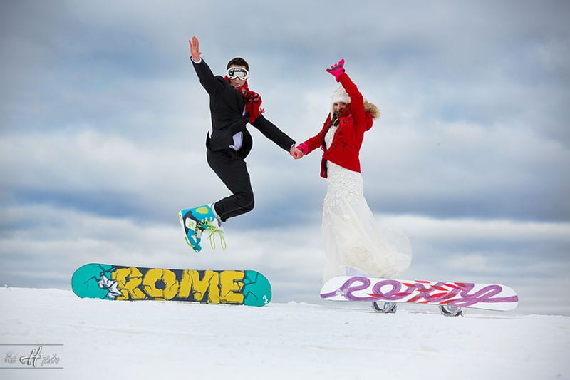 Adrian and Rodica have snowboards made by Rome and Roxy