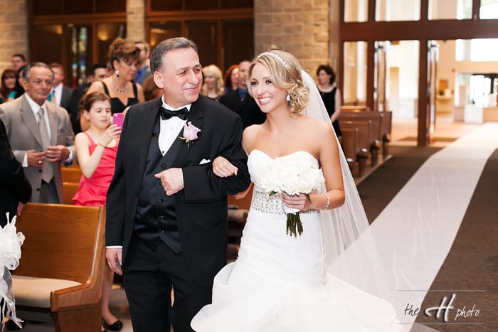 Emily's father bringing his daughter to the alter