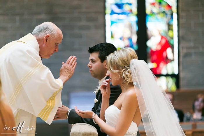 the priest declaring them mr and mrs