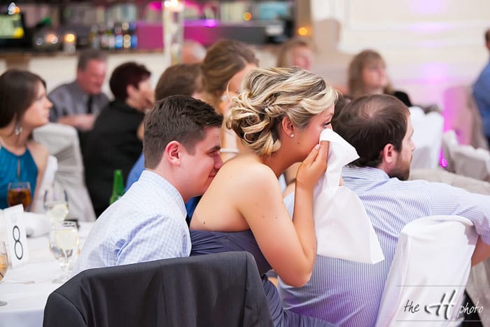 Bridemaid crying at the father daughter dance