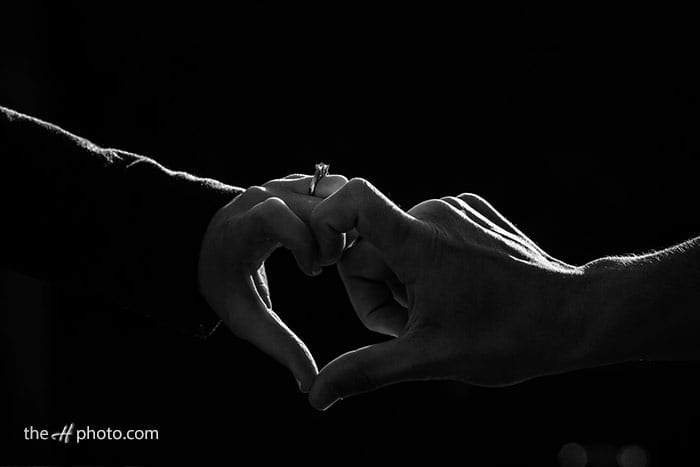 hands saying Engaged