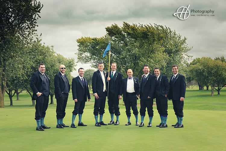 groomsmen posing on the golf course at Bloomingdale