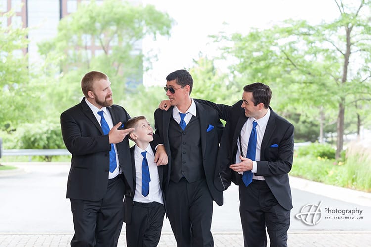 Frank and his groomsmen wore bright blue ties and handkerchief.