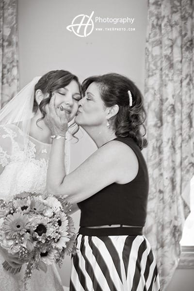 mother-kissing-the-bride