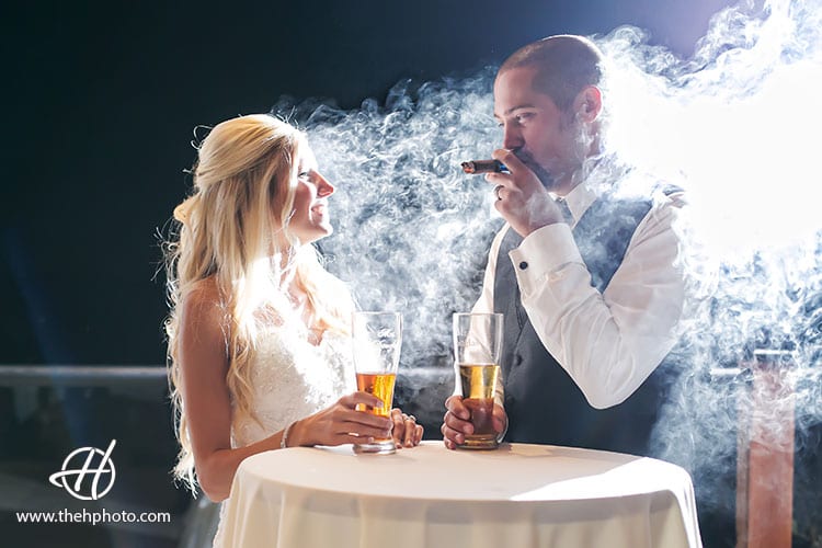 bride-and-groom-having-cigar