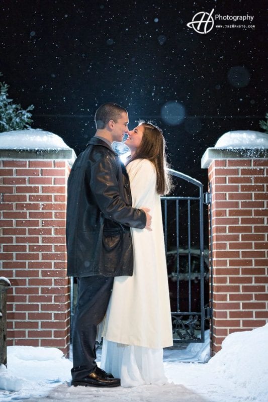 kissing-in-snow-wedding