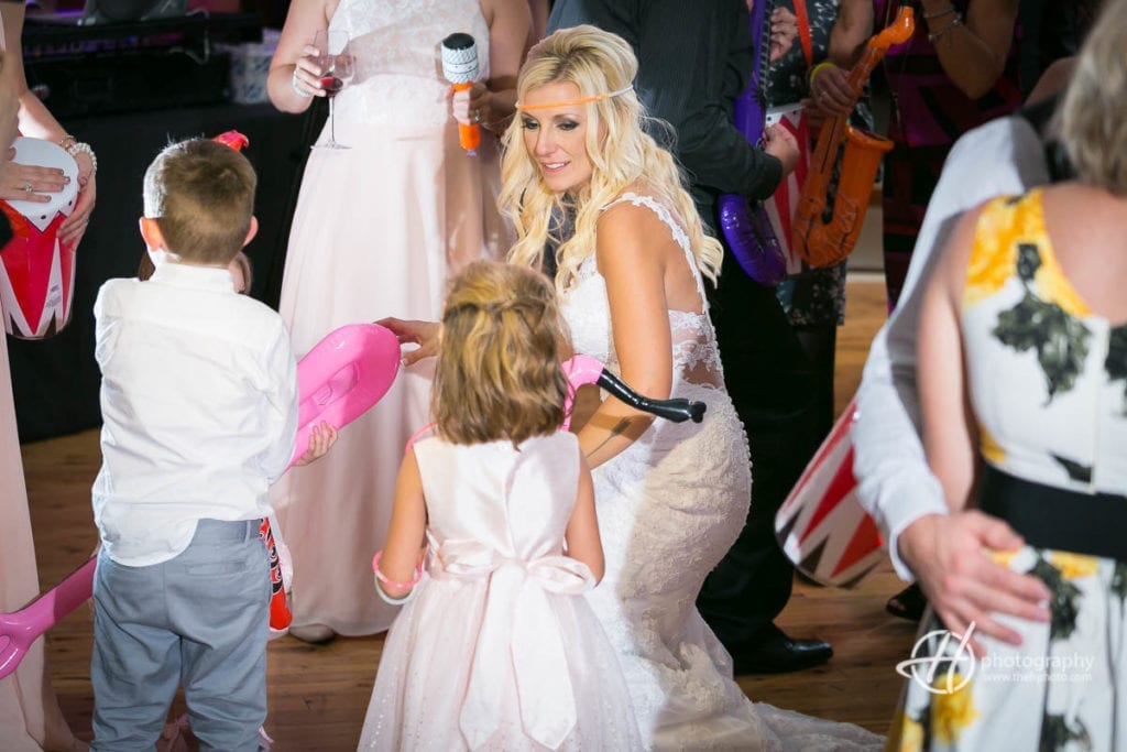 bride dancing with kids