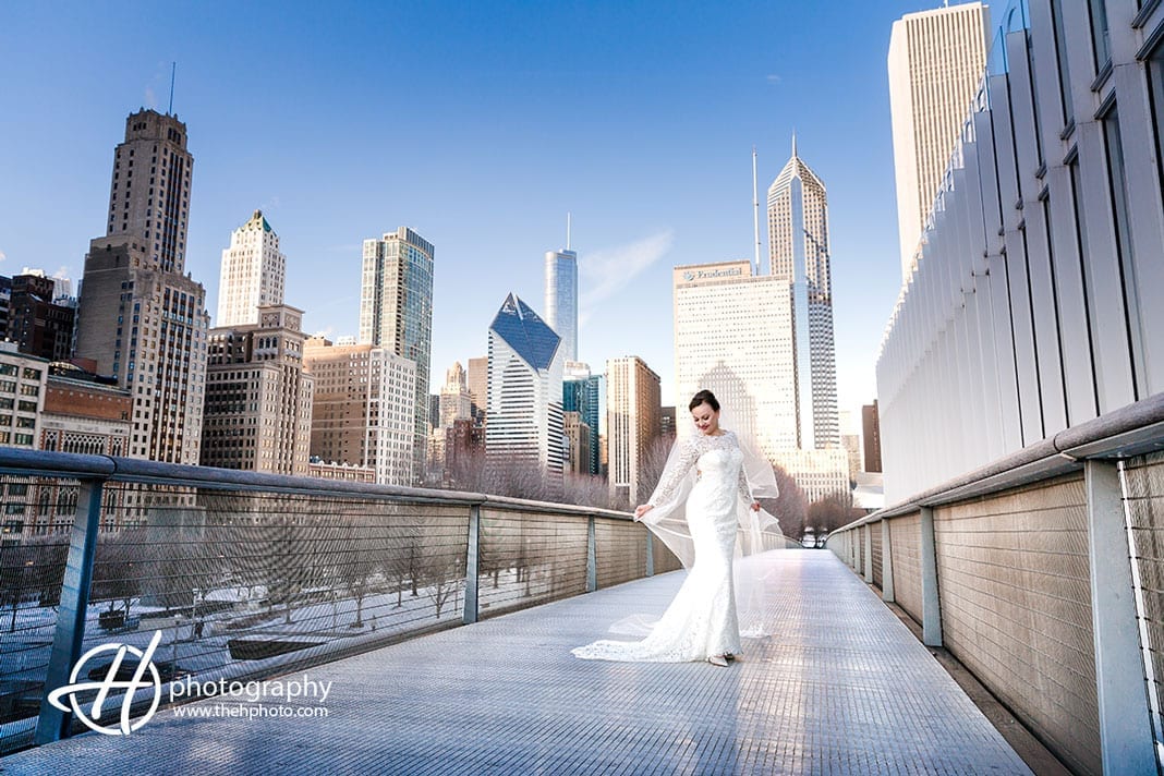 Wedding pictures on the bridge by the Art Institute Chicago.