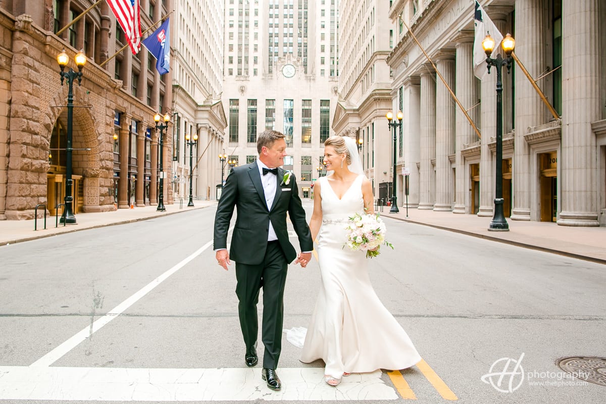 Rose and Robert walking in front of Chicago Board of Trade.